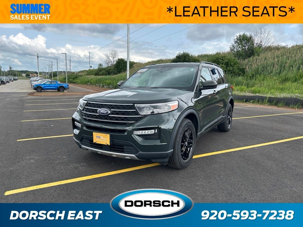 2023 Ford Explorer XLT in Forged Green Metallic — front three-quarter view