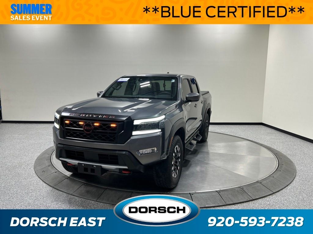 2023 Nissan Frontier PRO-4X in Gun Metallic — front three-quarter view
