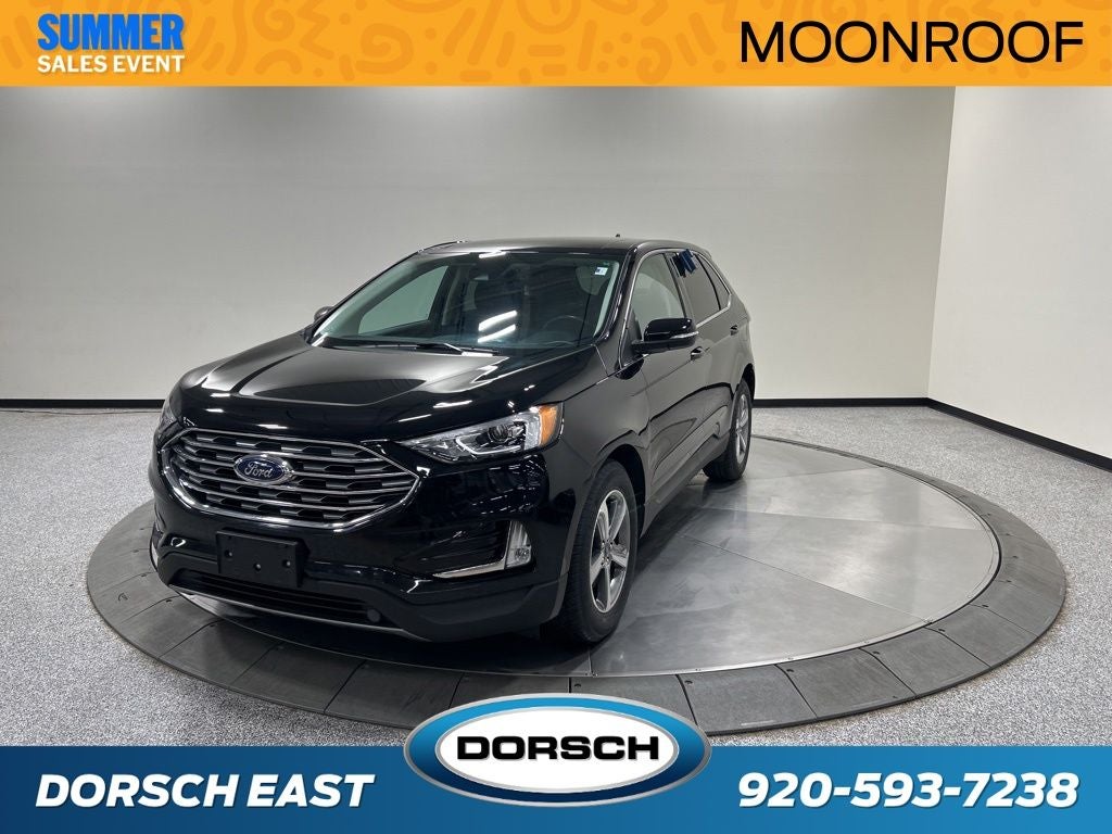 2019 Ford Edge SEL in Agate Black Metallic — front three-quarter view